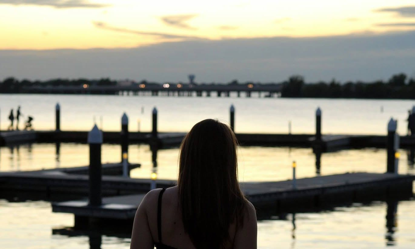 Sunset over the boat docks at The Harbor Rockwall on Lake Ray Hubbard — insurance Rockwall TX
