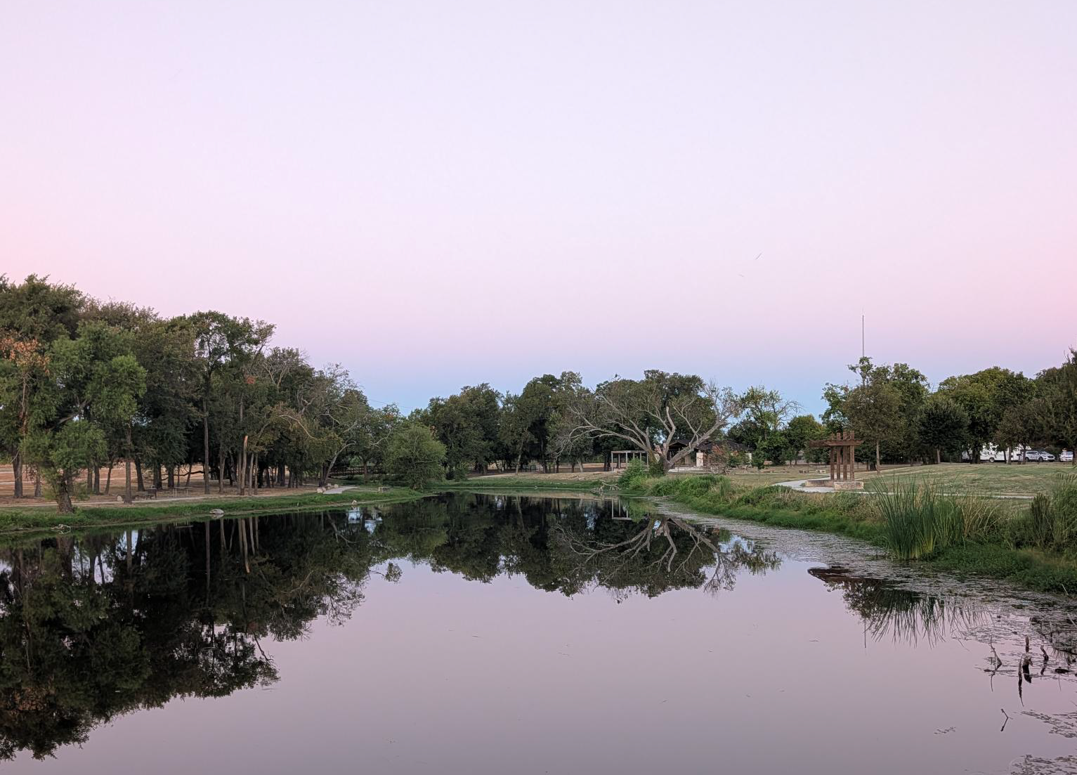 Founders Park pond at sunset in Murphy, Texas — Lavon Insurance, insurance agency serving Murphy TX